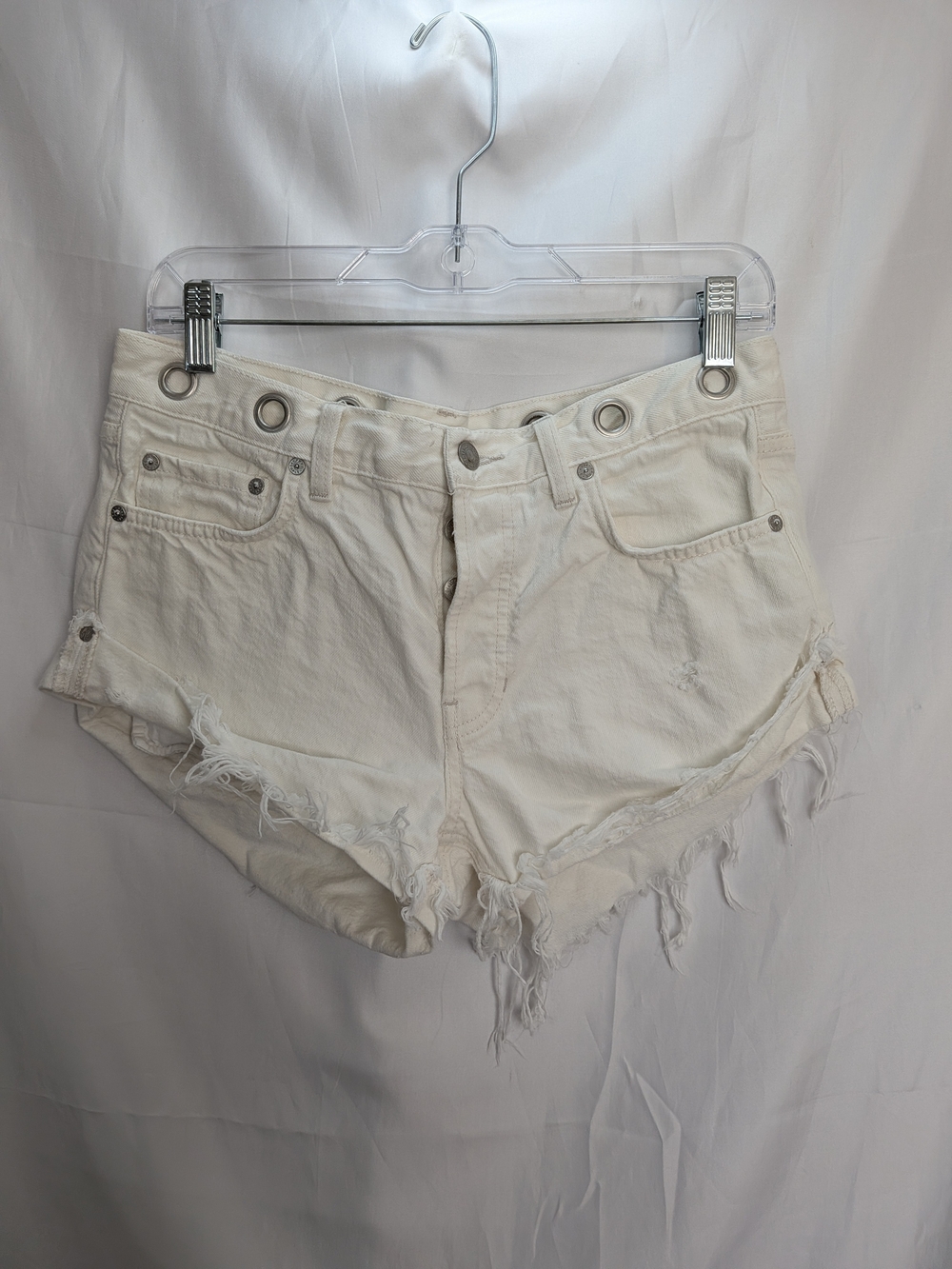 We The Free Free People Ivory Distressed Grommet Cutoff Denim Shorts Size 27